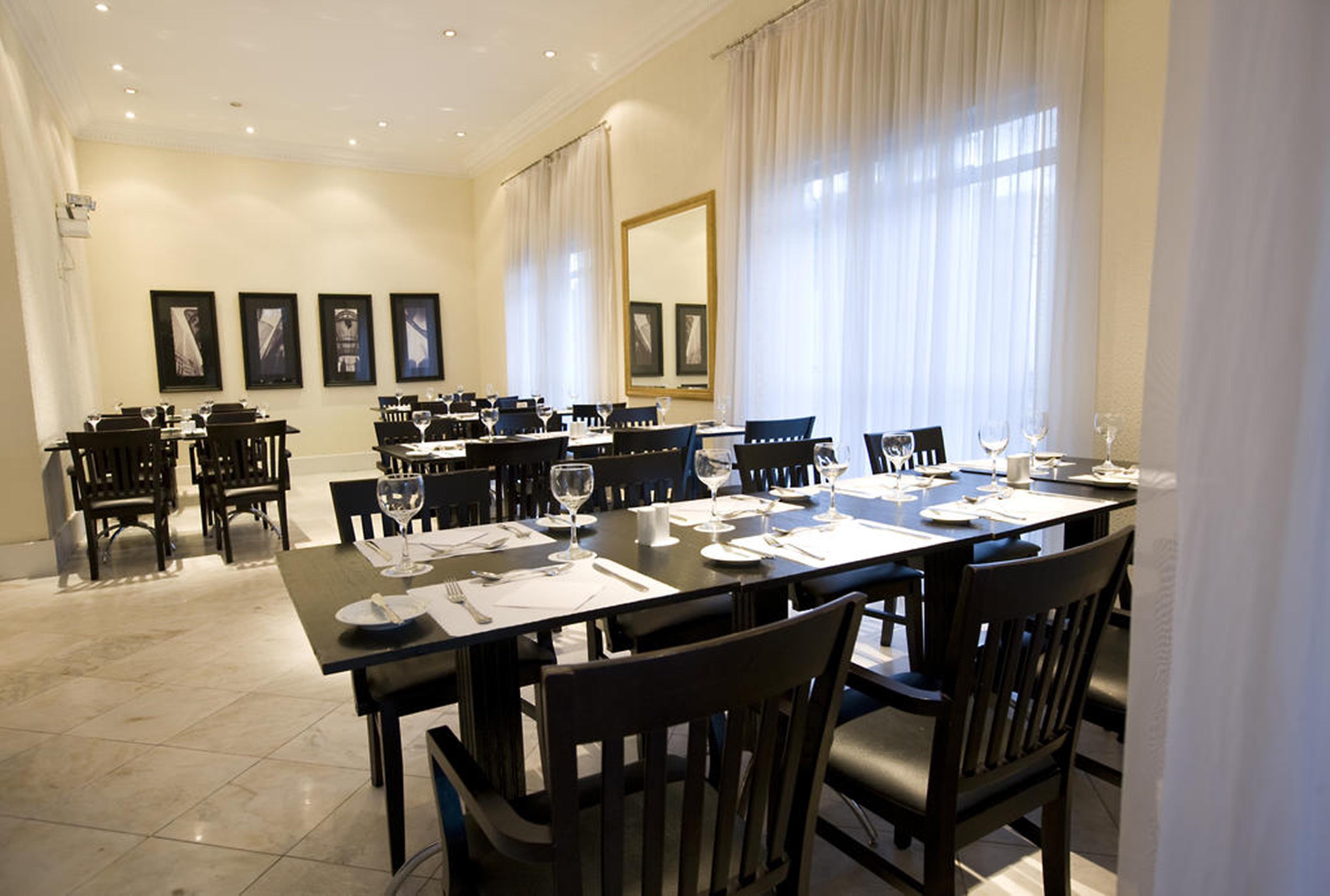 Rockefeller By Slaviero Hotel